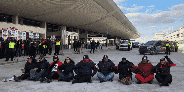 Rashida Tlaib Briefly Detained After Joining Protest at Airport Over Low Wages