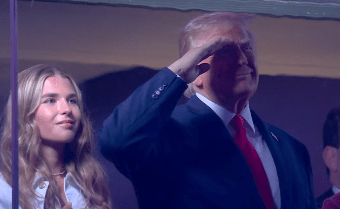 Trump Draws Cheers, Boos at Historic Finals Appearance